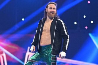 Sami Zayn turns his back on Cody Rhodes during Gunther's post-match attack
