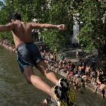 Popular city bans public alcohol amid heat wave as people take risks to cool down