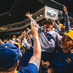 West Virginia's epic walk-off sparks emotional 'Country Roads' celebration that defines college sports