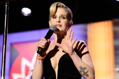 Kelly Osbourne wows in leopard-print swimsuit as she steps 'away from the madness'