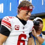 Giants' Jaxson Dart tried to reenter game with knee injury but had jersey taken away: reports