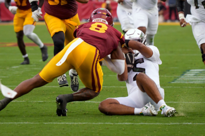 Oregon Ducks QB Dante Moore carted off the field after a vicious hit to the head against USC