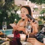 Restaurants lock up customers' phones as devices become the 'new cigarettes'